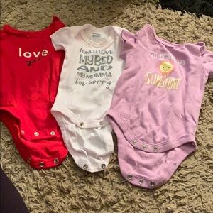 3 graphic onesies